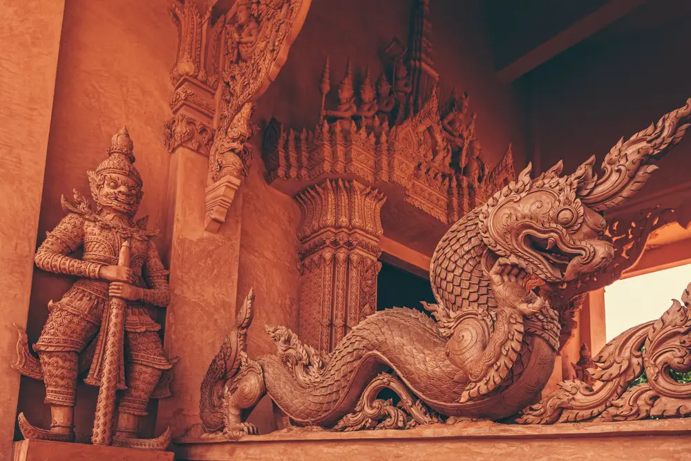 Wat Ratchathammaram - Red Temple on Koh Samui. Red Temple is full of fascinating details of stone ornaments and architecture in Thailand. Watch out for the dragons.