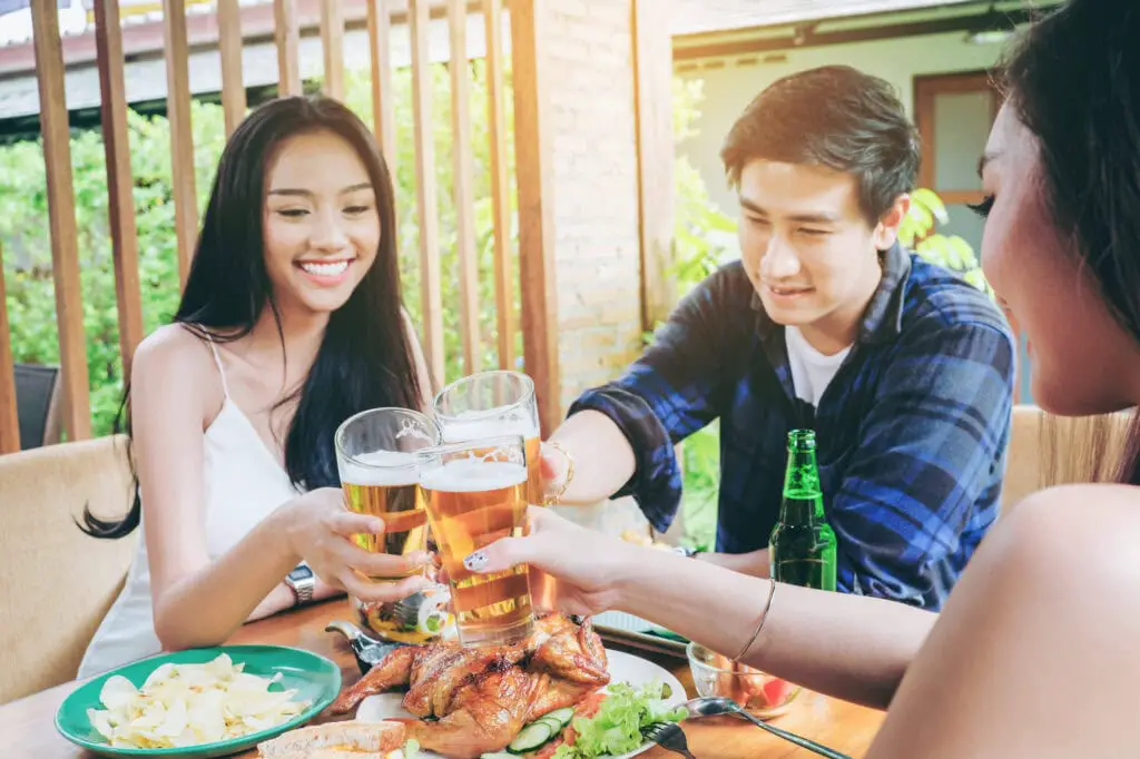 Legal Drinking Age in Thailand - Social Drinking Sharing a Beer