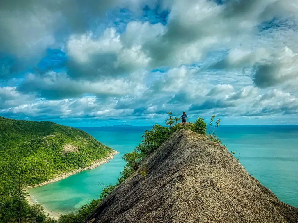 woman on top of bottle beach